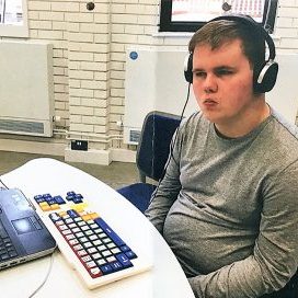 45-young_man_at_computer_W600